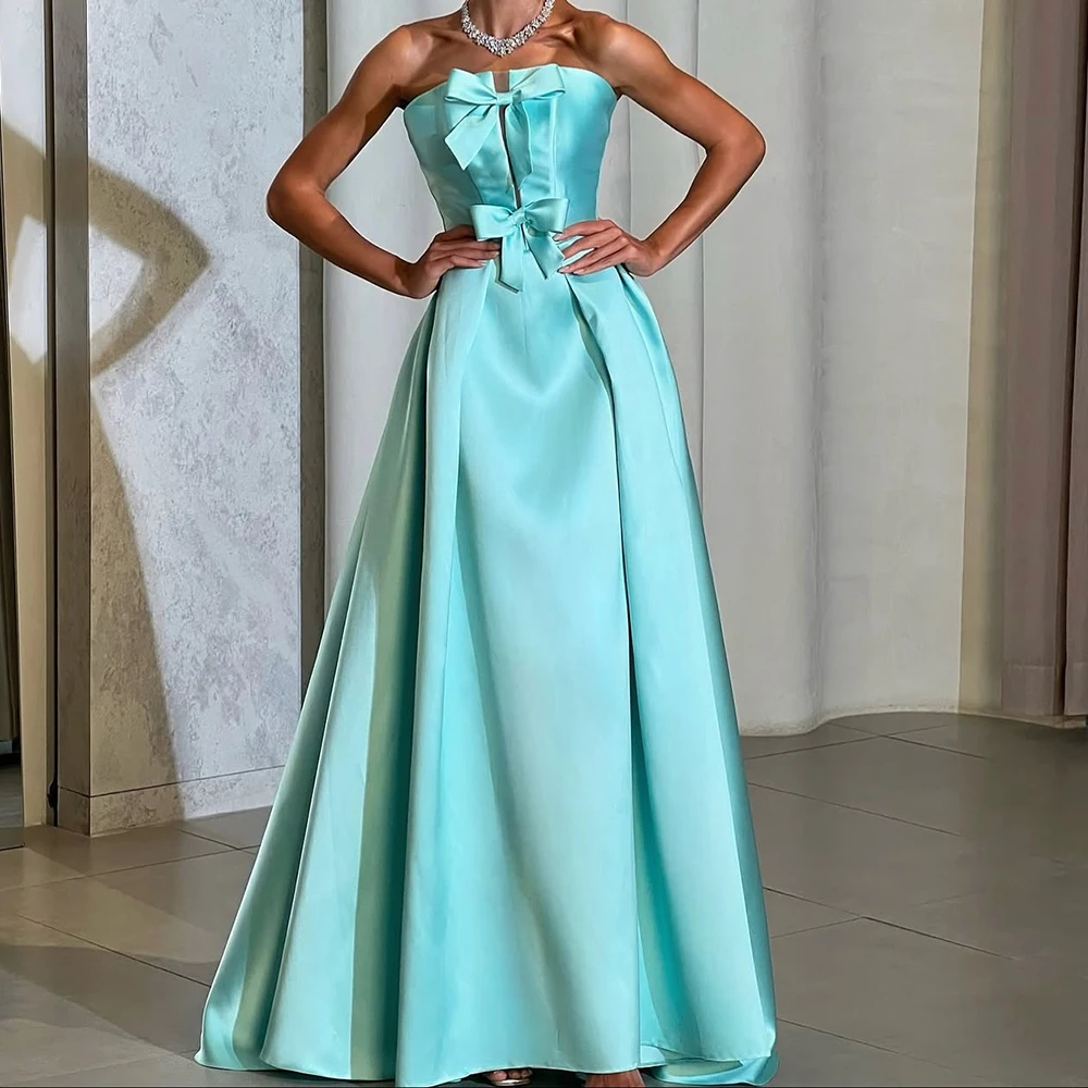 Op maat gemaakte A-lijn avondjurken Vloerlengte strapless mouwloze galajurk Fsahion strik Eenvoudige gedrapeerde rugloze feestjurk