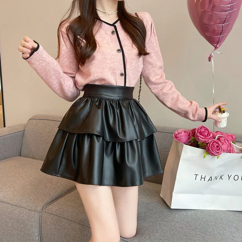 

Черные плиссированные юбки из искусственной кожи, женские корейские милые каскадные юбки с оборками, женские утягивающие пышные юбки трапециевидной формы с высокой талией