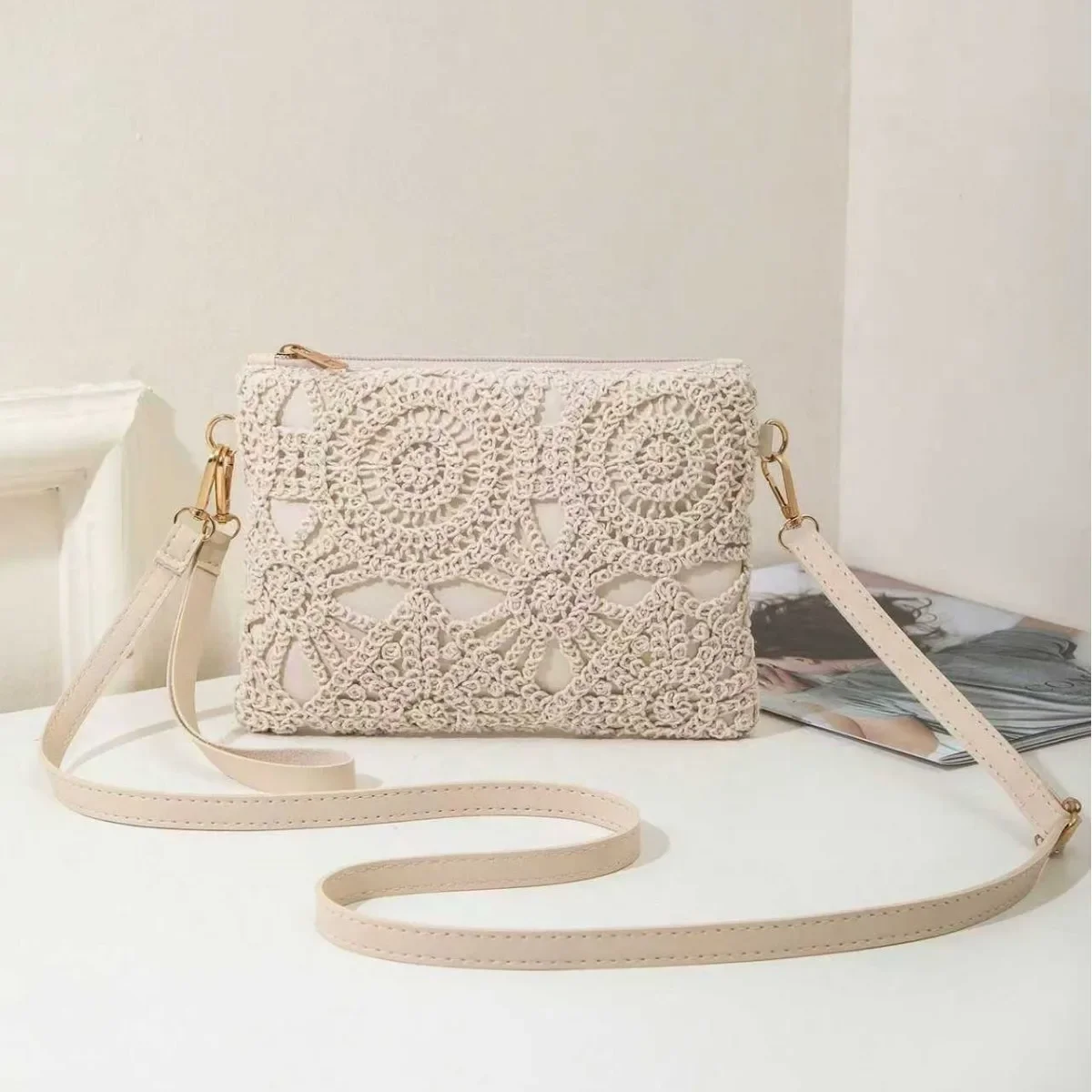 

Elegant Lace Crossbody Bag Featuring Intricate White Lace Patterns, Paired with a Simple Nude Strap, Showcasing a Feminine Charm