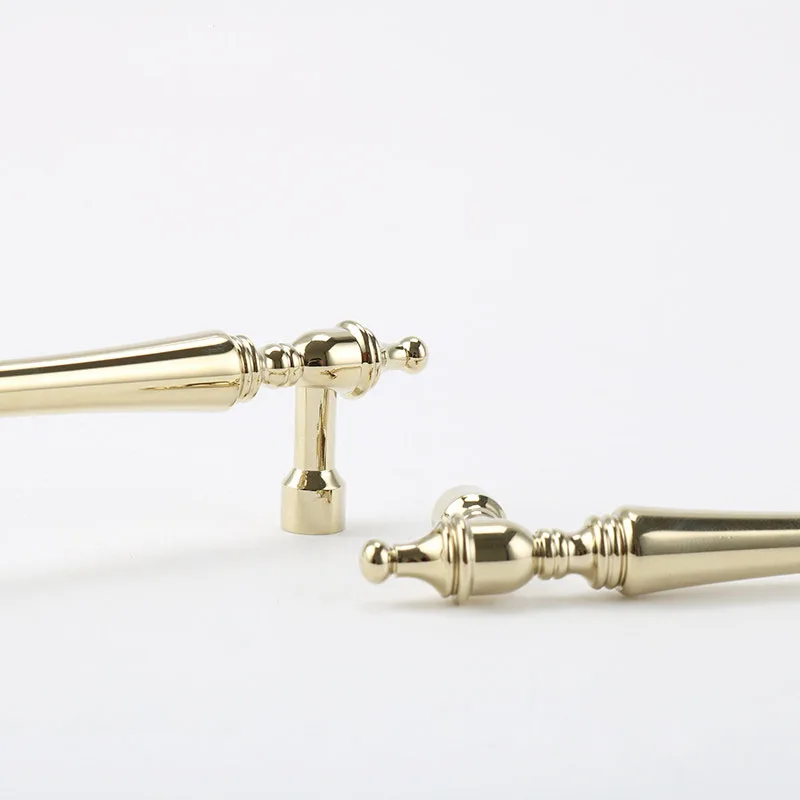 Gold pull mounting foot shown from the side