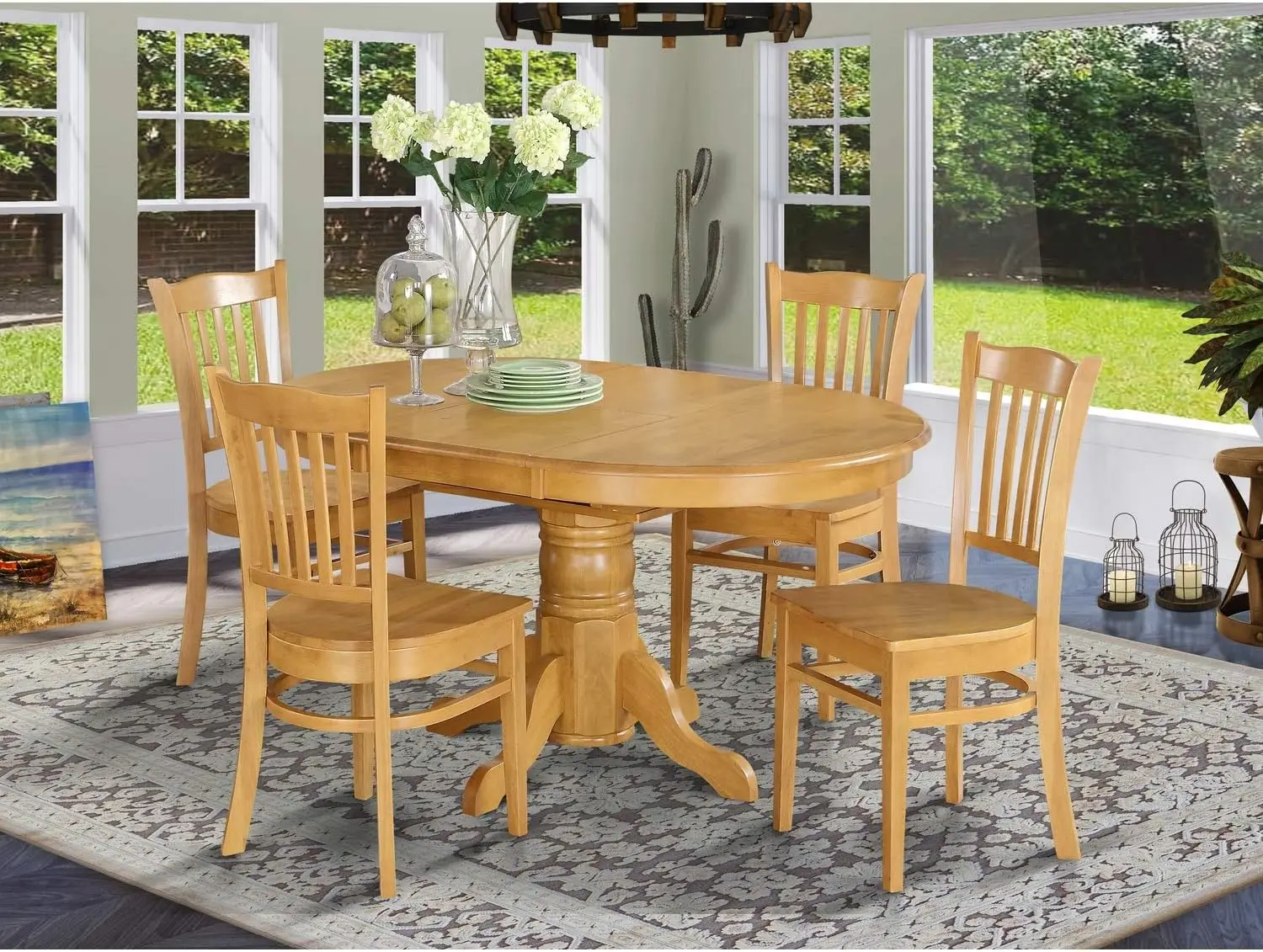 

East West Furniture AVGR5-OAK-W Avon комплект из 5 предметов включает Овальный кухонный стол с листьями-бабочками и 4 обеденными стульями,