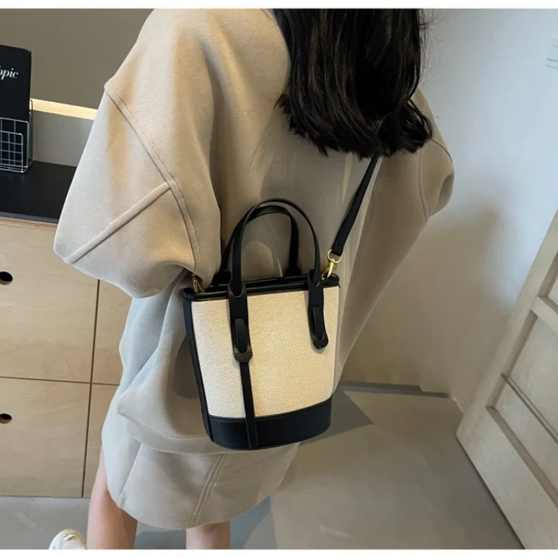 2026 explosions contrast color bucket bag female Joker shoulder slung commuter bag urban minimalist advanced wind bag