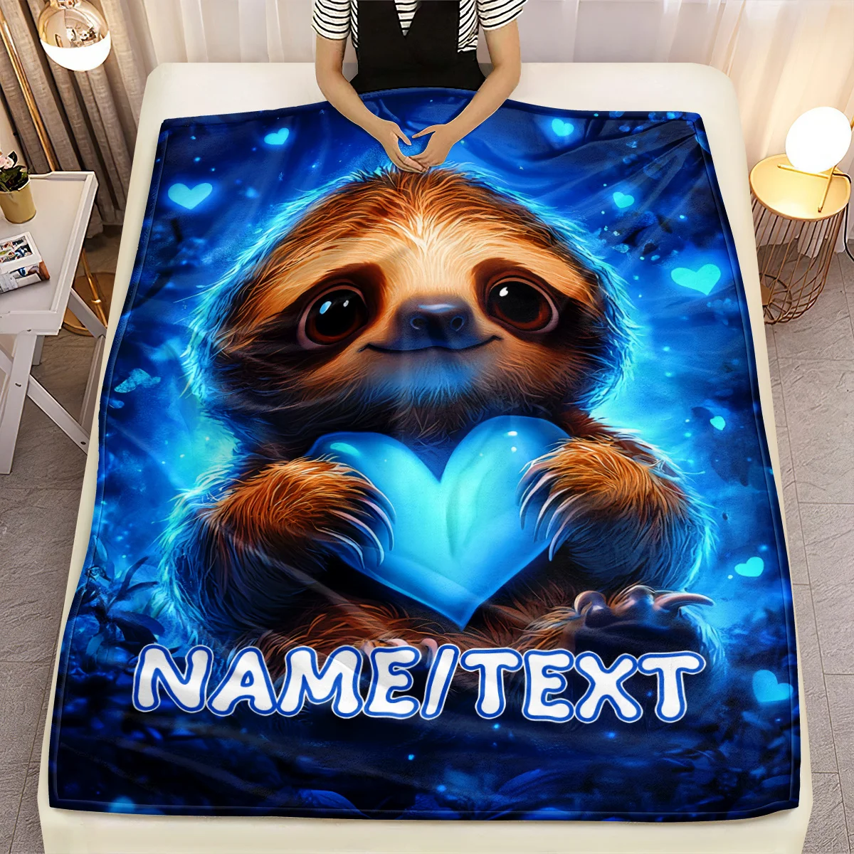 

Customized name sloth blanket with soft and warm flannel parabolic shape, featuring a luminous heart shape