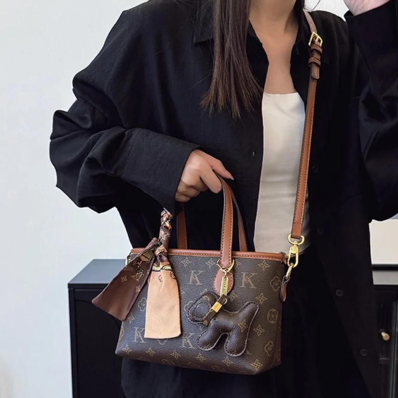 

Новая винтажная сумка 2025 года в элитном европейском и американском стиле, универсальная сумка-ведро для пригородных поездок.