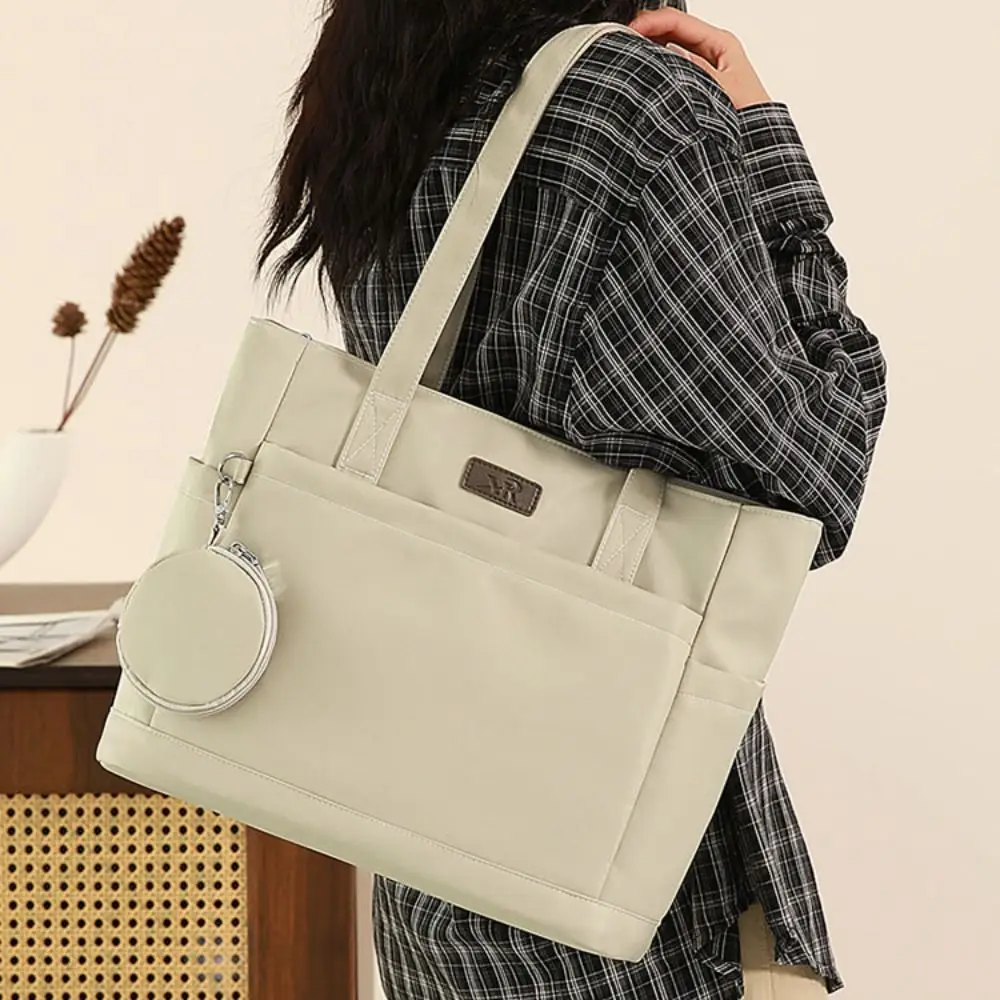 

Versatile Nylon Cloth Shoulder Bag Large Capacity Solid Color Canvas Tote Bag Simple Japanese Style Commuting Handbag Travel