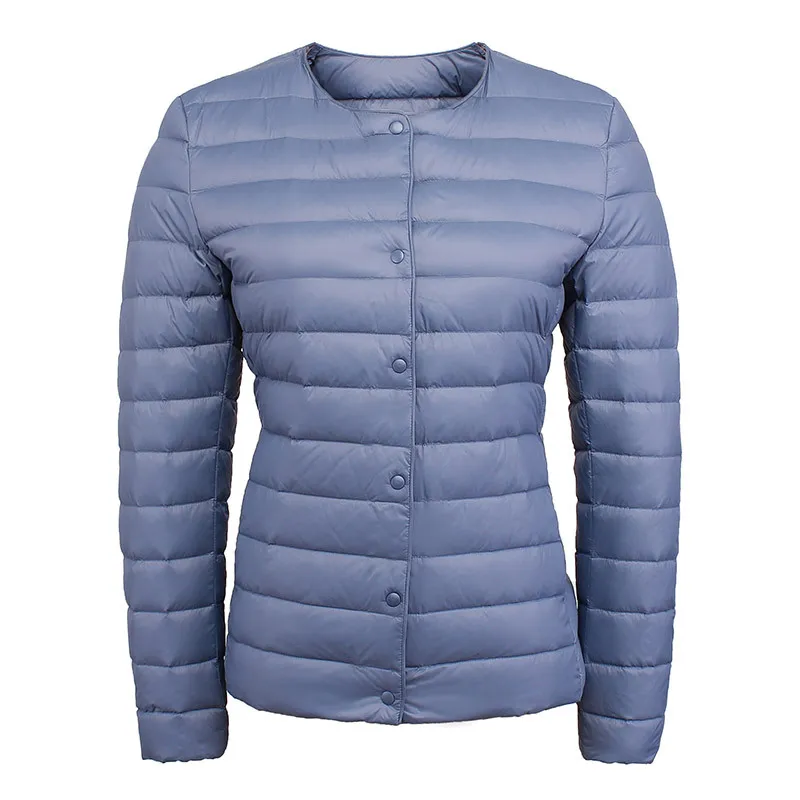 

New Standard 90% down fill, round/V-neck, lightweight warmth. Versatile inner layer with minimalist style.