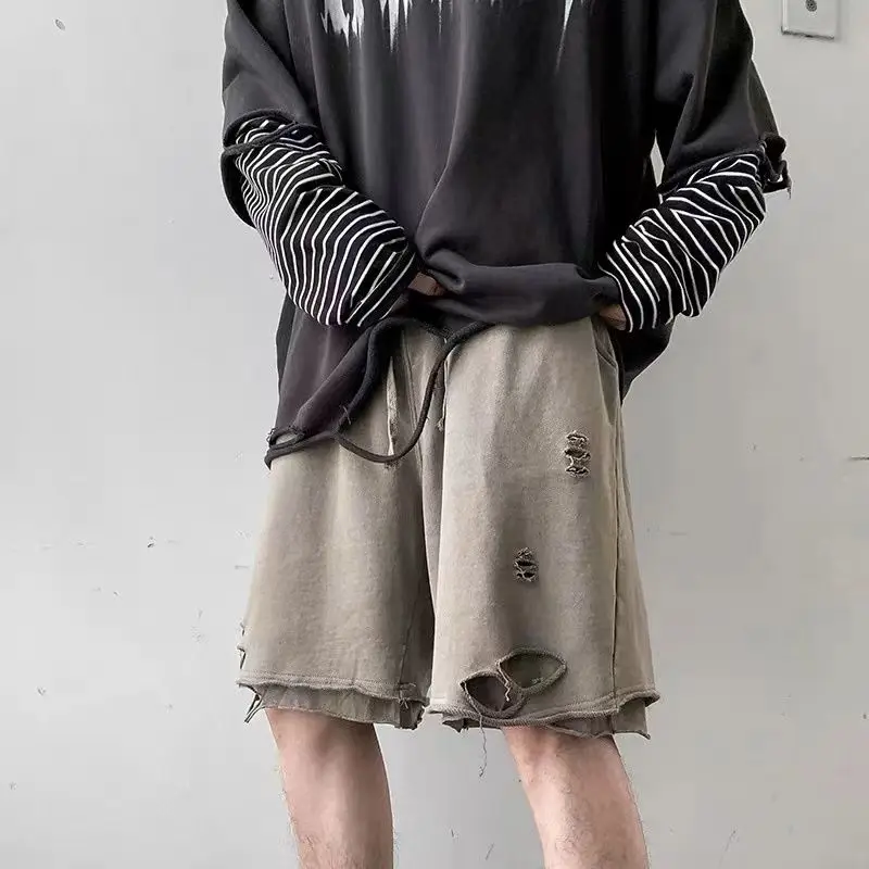 

High Street Ripped Shorts Men's Loose Korean Style Fashion Sports Pants Fake Two-Piece Layered Five-Cubic Pants