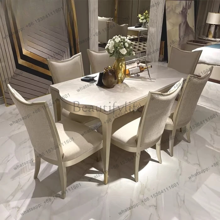 Light luxury post-modern rectangular simple American dining table and chair combination champagne gold solid wood