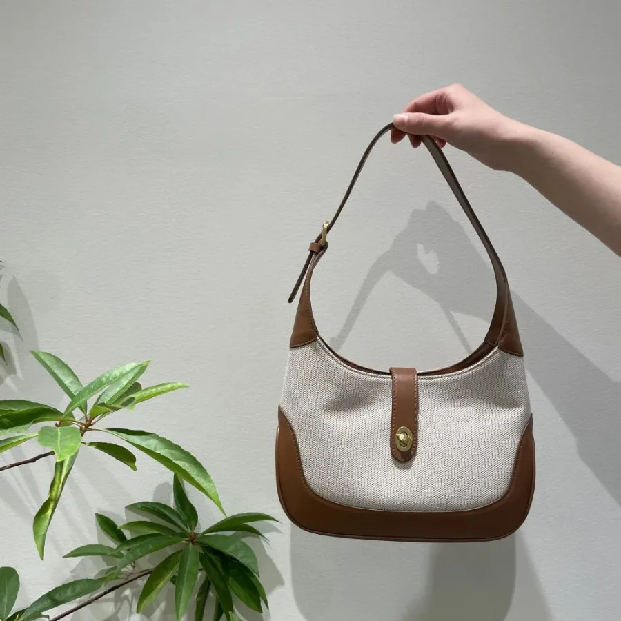 

Spring and summer new senior women's bag retro canvas shoulder armpit bag exquisite splicing texture color collision handbag