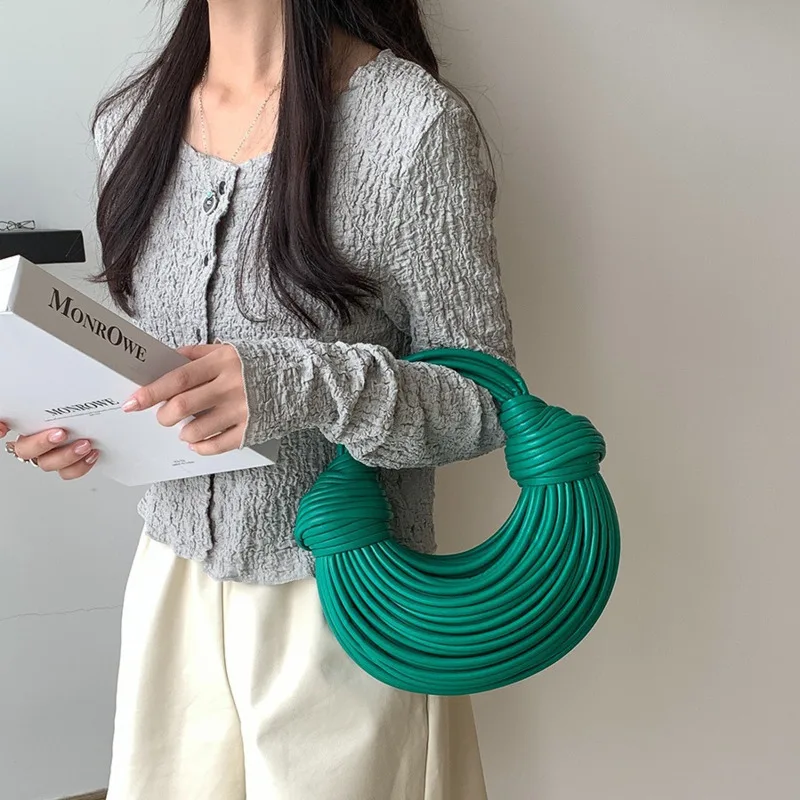 New woven bag with noodle texture, fashionable personalized hand-held dumpling bag, creative and niche design, crossbody bag