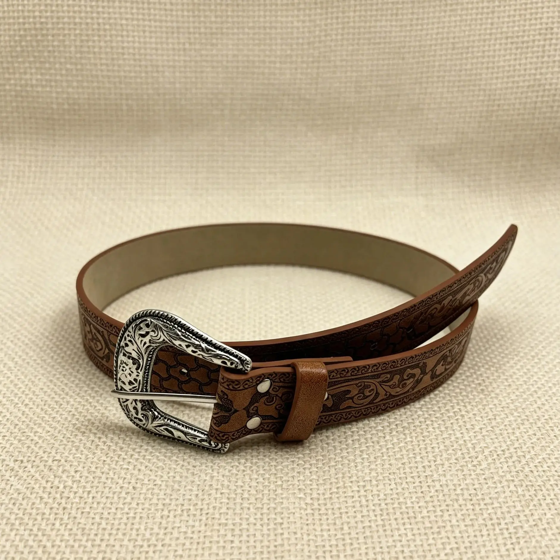 A Unisex Belt with Brown Rattan Buckle and Rivets, Featuring a Western Cowboy Style, Vintage Look, Perfect for Matching Jeans