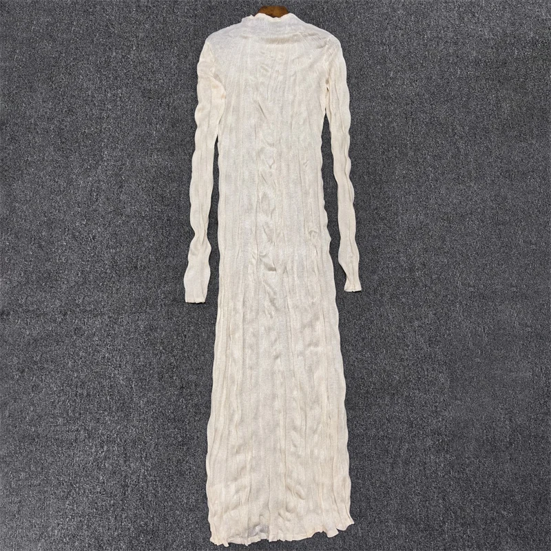 Immagine 3: Abiti casual da donna: Nuovo vestito lungo slim fit girocollo per l'estate 2026, in maglia elasticizzata che avvolge i fianchi, perfetto per le vacanze.