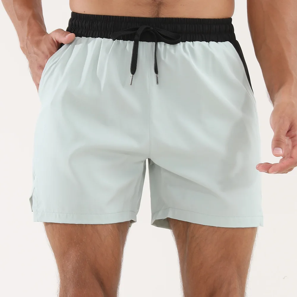 Celana pendek kasual olahraga Crazy Muscle untuk pria, latihan kebugaran, lari, gaya tipis satu lapis cepat kering musim panas, ukuran Eropa