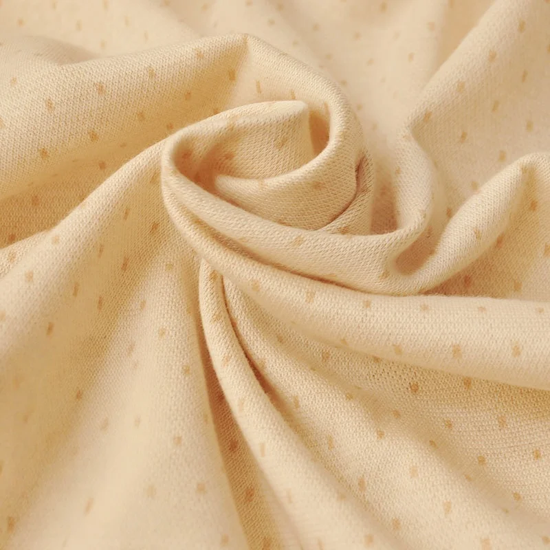 Jacquard cotton knit fabric made of pure cotton, suitable for babies, of organic class A, with cartoon patterns.