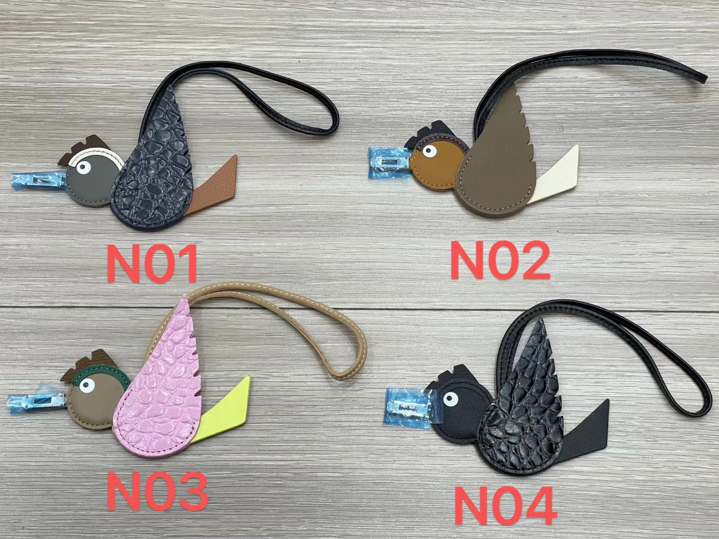 Bolso Qute Birdy de piel de becerro auténtica de alta calidad, bolso con dije, decoración de gota de pájaro, adorno colgante, llavero en 4 colores