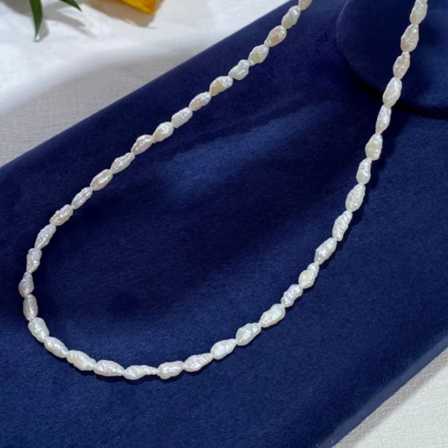 

Charming Genuine White Baroque Pearl Necklace 17" 7x10mm