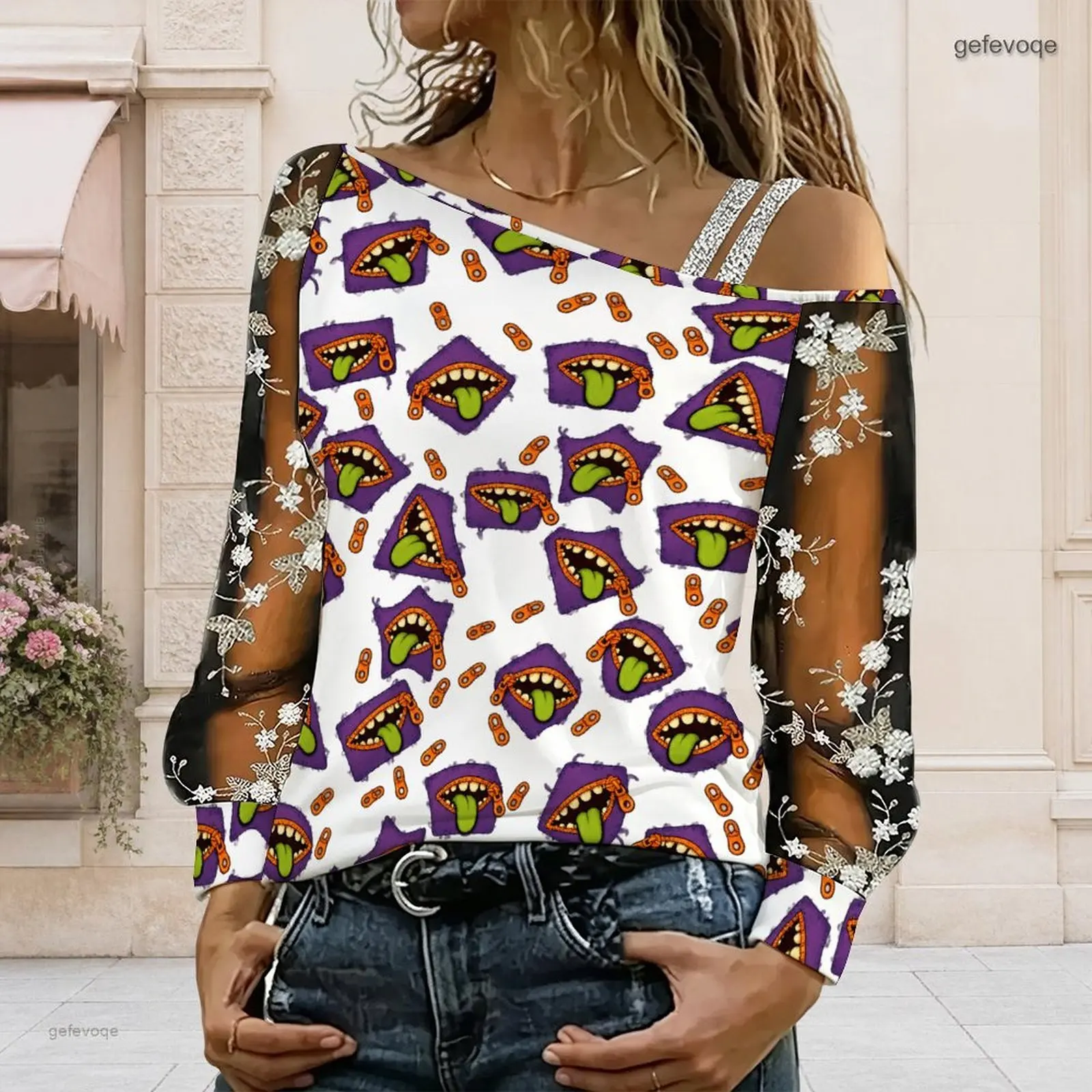 Women Cartoon Voodoo Doll Lightning Star Print Asymmetric Cold Shoulder Long Sleeve Embroidered Sheer Top