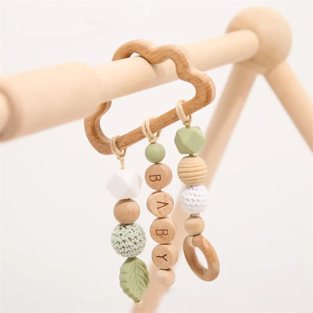 Simple Anti-lost Wooden Baby Rattle Toy Handmade Montessori Handbell Rattle Toy Silicone Food Grade Wooden Rings Toy Toddler