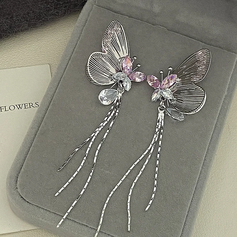 

Silver tassel shining purple three-dimensional butterfly earrings heavy industry light luxury beautiful temperament earrings