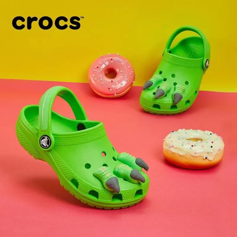 Original Crocs chico dinosaurio Kawaii dibujos animados lindos niñas niños sandalias niños zapatillas zapatos con agujeros antideslizantes playa hogar zapatos regalo