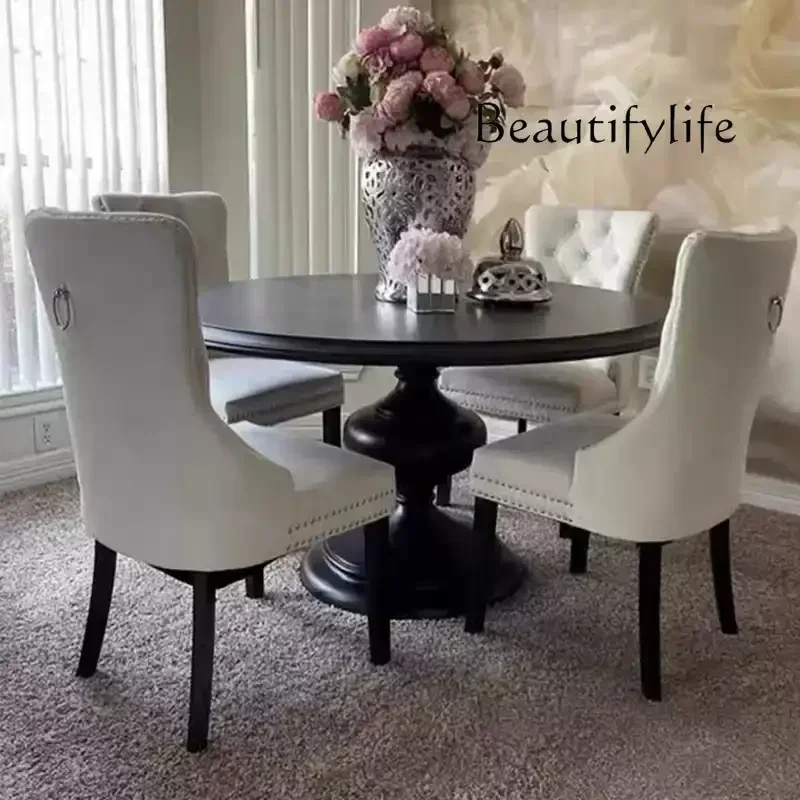 

French retro solid wood dining table, high-end medium and antique dining table, designer retro black household round