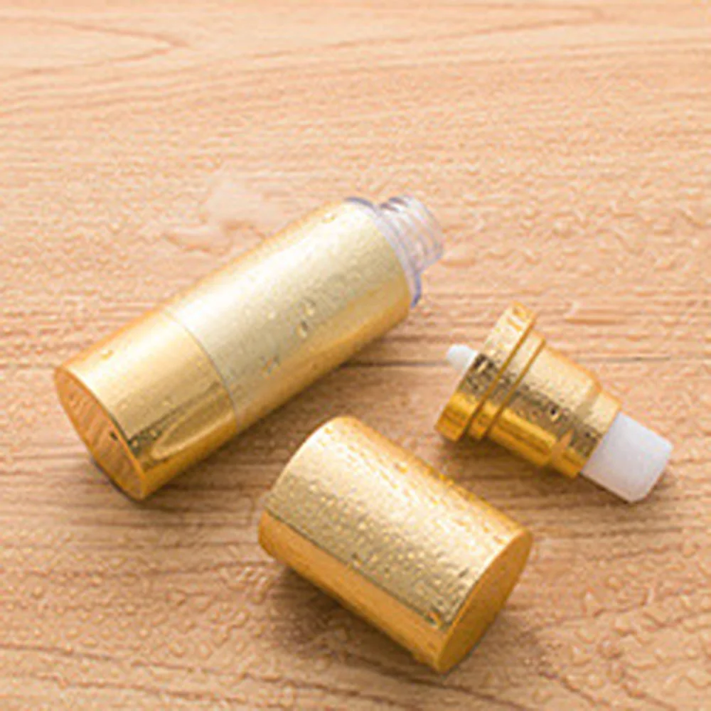 30ml&50ml capacity gold color round shape acrylic material alumite Vacuum lotion bottle with duckbilled pump and cap