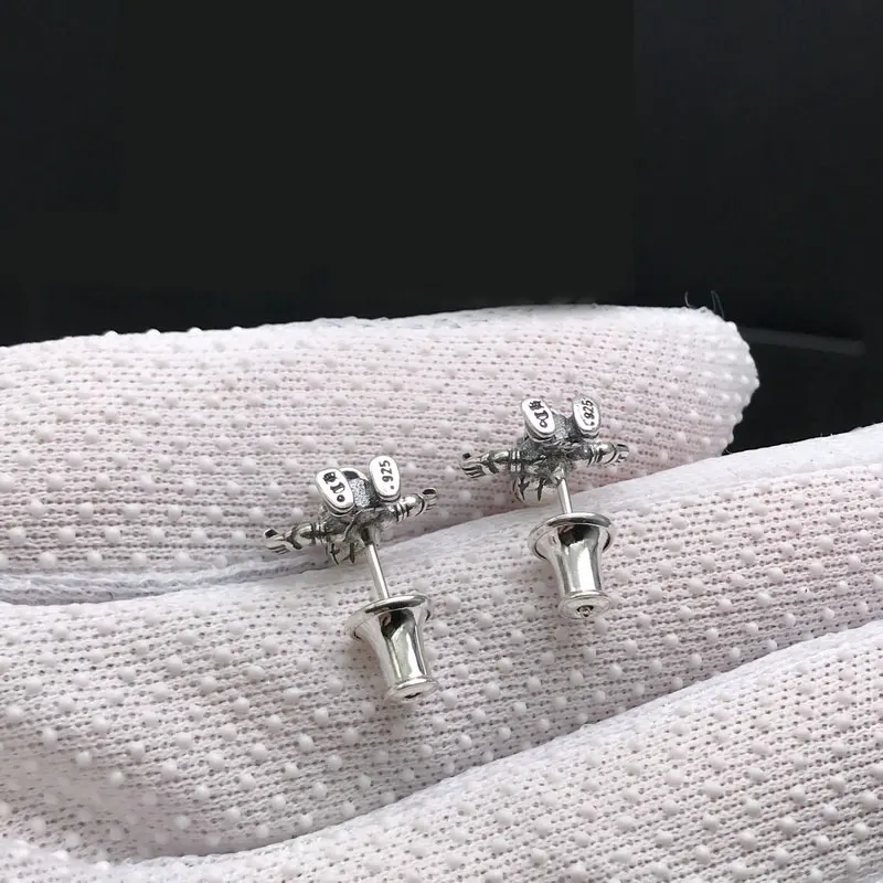 Hip-Hop hipster 925 sterling silver cross skull stud earrings for men and women vintage Thai silver bone soldier stud earrings