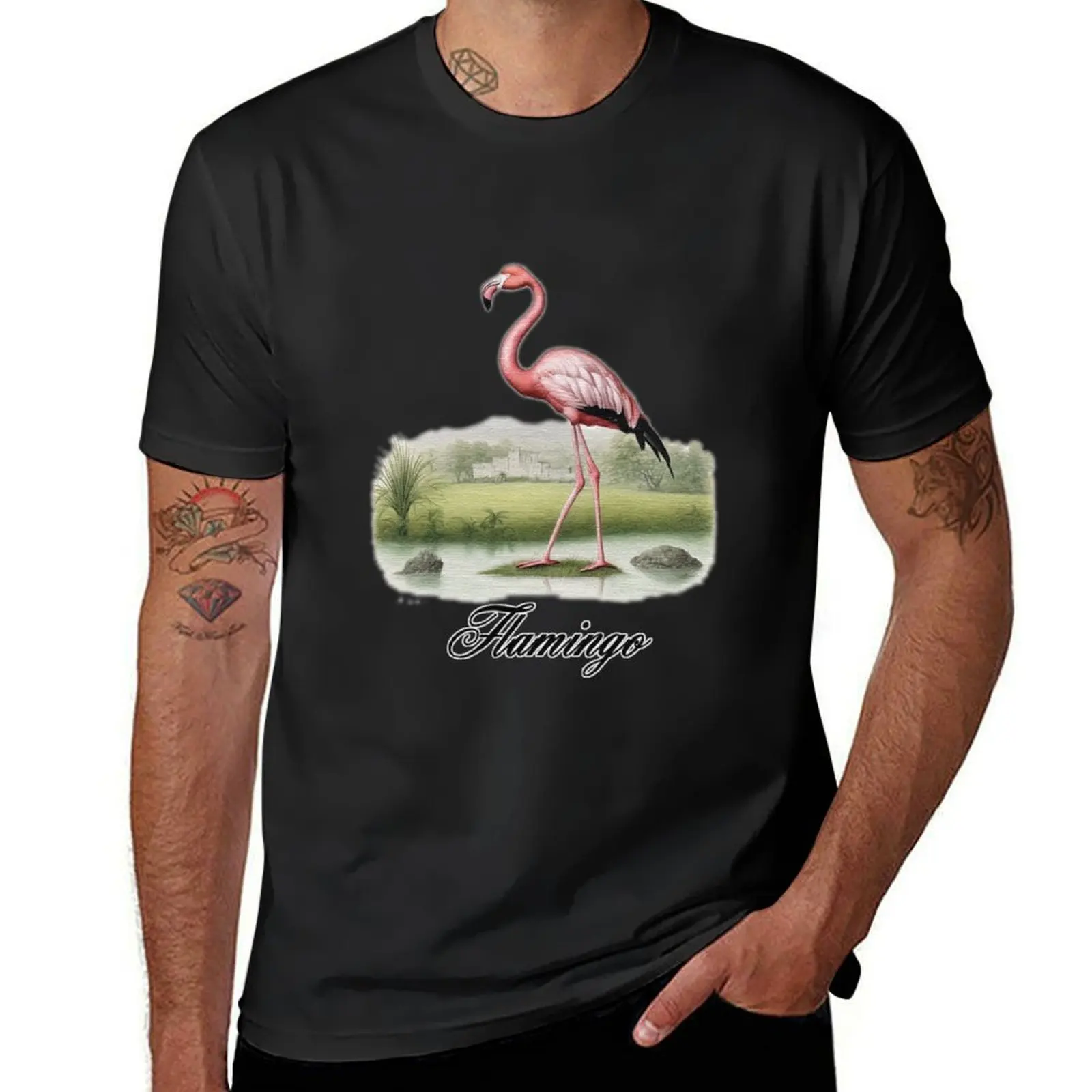 a Flamingo standing on a grass covered field T-Shirt Short sleeve tee boys animal print mens tall t shirts