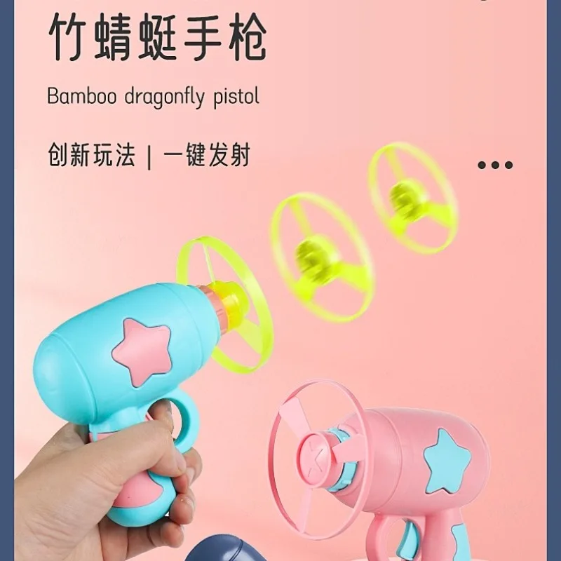 Juguetes para niños: libélula de bambú luminosa, juguetes interactivos para entrenamiento de gatos y perros, frisbee giratorio con luz y pistola de juguete.