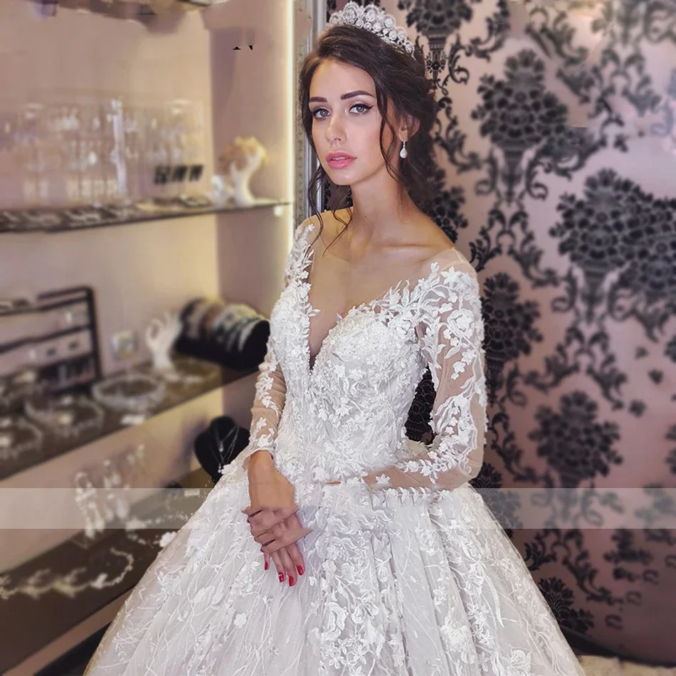 Flavinke カスタマイズされた夜会服のウェディングドレスプリンセス背中の開いたビーズレースアップリケ長袖ブライダルドレス Vestidos De Novia