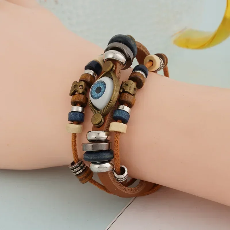 남성 여성을위한 악마의 눈 팔찌 빈티지 가죽 로프 멋진 조절 가능한 계층화 된 팔찌 매력 터키 쥬얼리 할로윈 코스프레