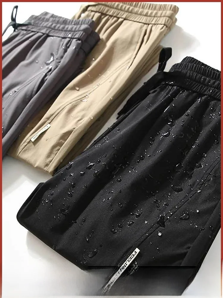 

Мужские модные спортивные свободные повседневные брюки прямого кроя с лазерной перфорацией Qui Dry, дышащие, водонепроницаемые