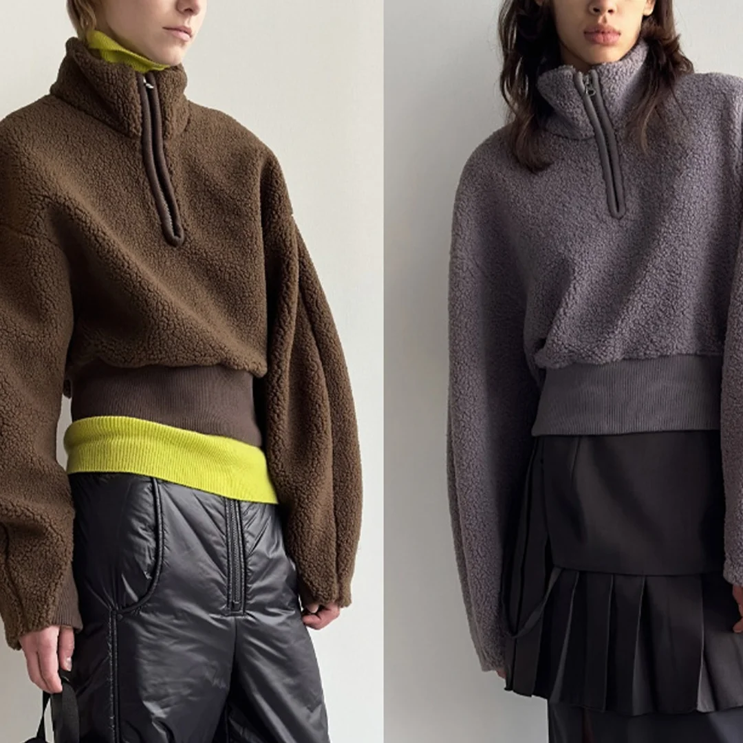 

Новое поступление осени/зимы: женская пуловерная толстовка с короткими рукавами, молнией до половины, высоким воротником и длинными рукавами.