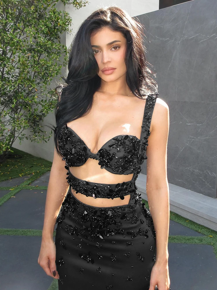 فستان طويل بتصميم أسود مضيء بدون أكمام مزين بالترتر والقطع من أجل فستان الليل الرسمي للتاريخ