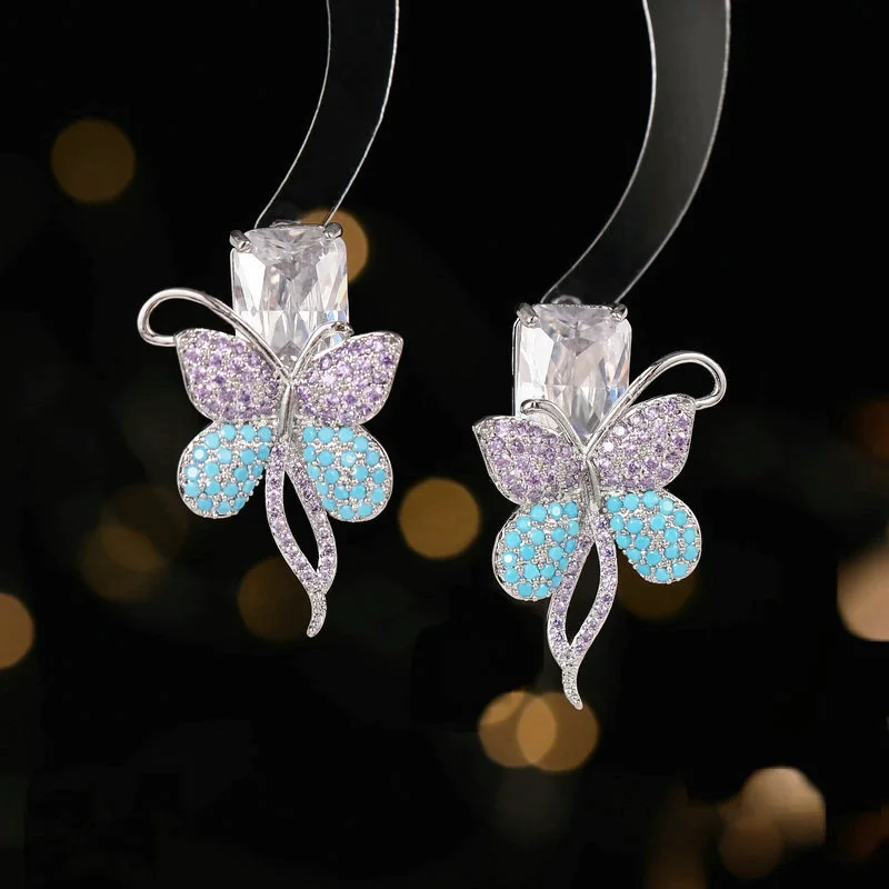 

The high-end designer earrings are studded with zirconia and set with butterfly stud earrings