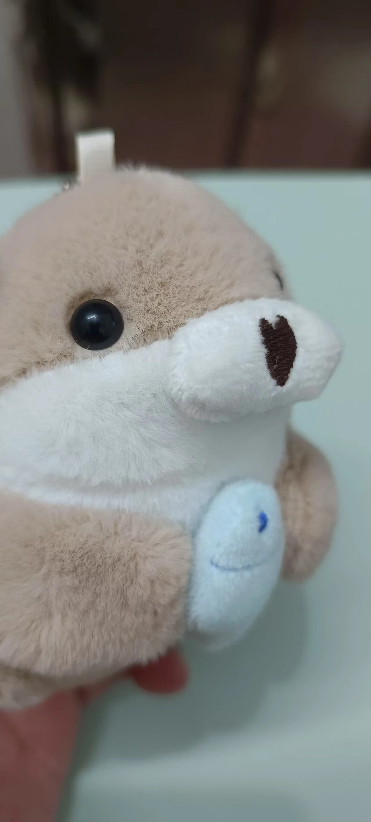 

Nuevo muñeco de nutria de 11cm, pequeño animal de peluche, Mini muñeca de viento rojo de Internet, decoración de mesa, regalo
