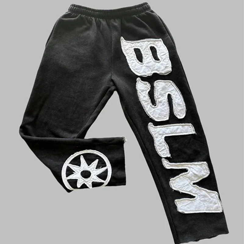 Outono inverno nova moda americana rua calças masculinas casal cintura elástica roupas esportivas carta remendo solto casual calças femininas