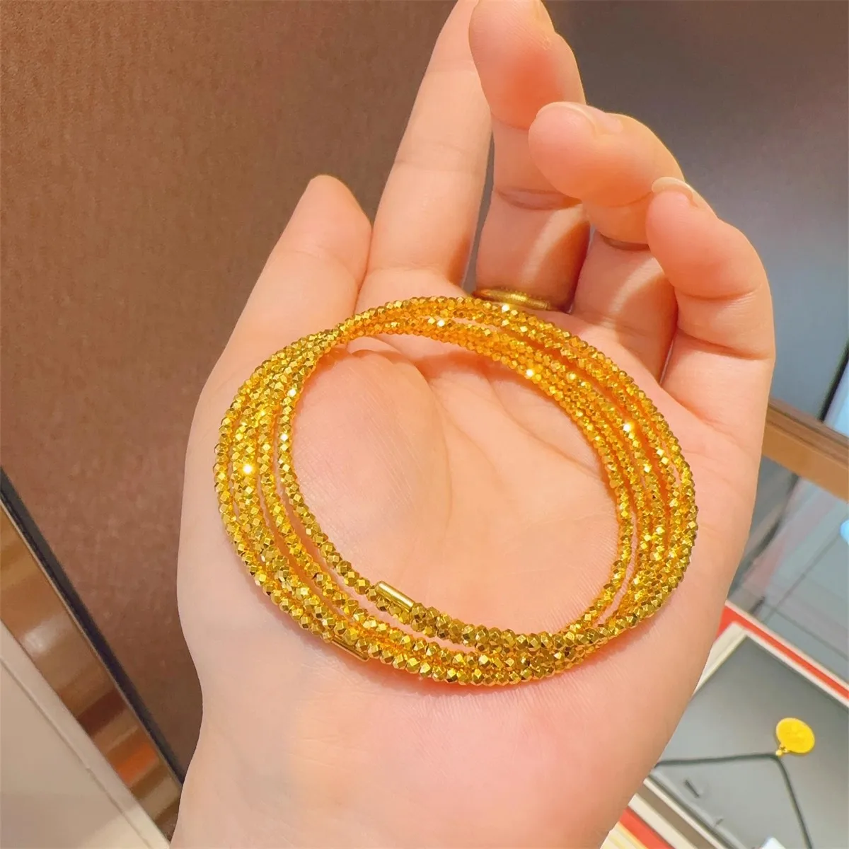 

Popular AU999 Sparkling Bounce Di Bead Three Loop Bracelet with Open Female Spring Memory Bracelet, Plain Loop Bracelet