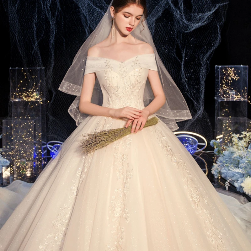 Abito da sposa leggero, velo principale della nuova sposa, temperamento lussuoso, stile palazzo monospalla, abito da sposa con strascico del cielo stellato