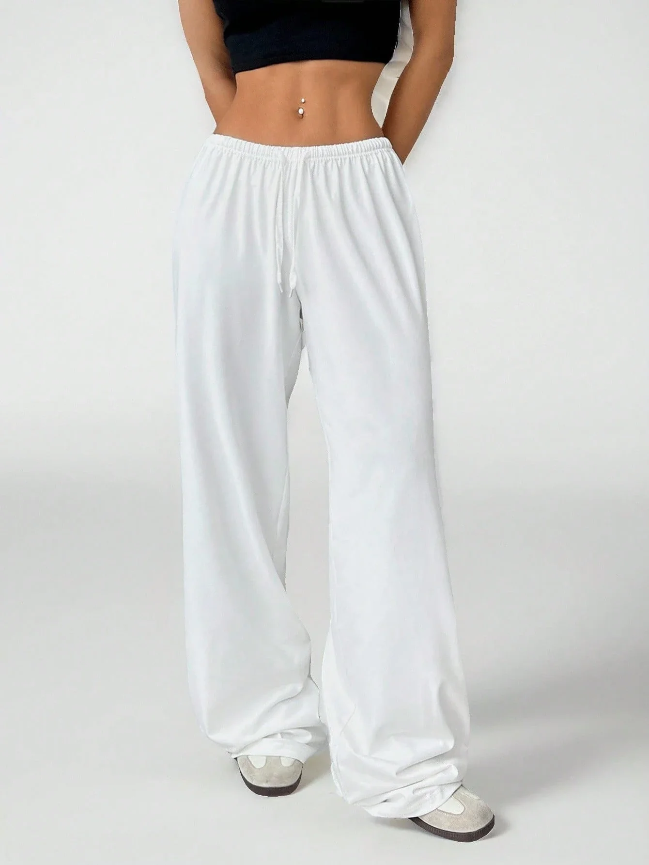 

Мягкие белые вязаные свободные брюки с широкими штанинами для женщин