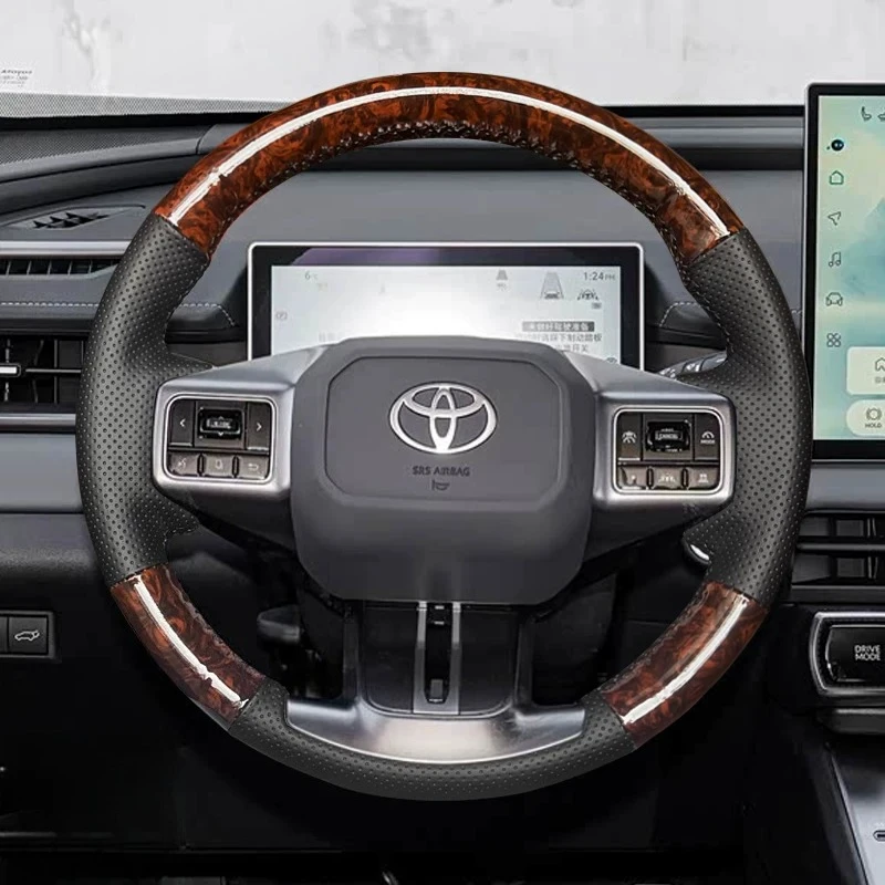 For Toyota RAV4 Wildlander 2026 Hand-stitched non-slip black genuine leather peach wood grain car steering wheel cover