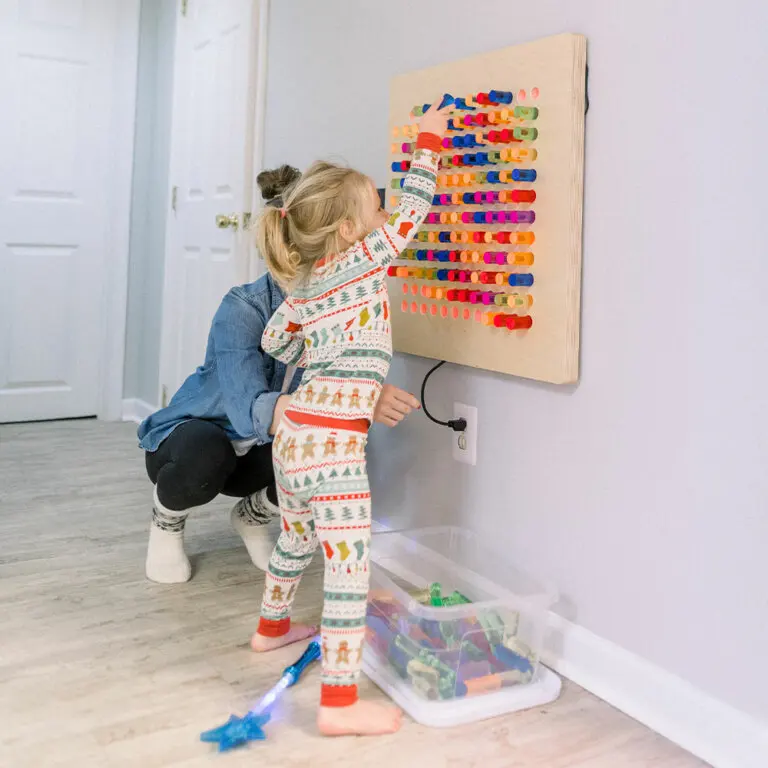 Montessori kindergarten early education corridor sensory wall puzzle hole light board building block board