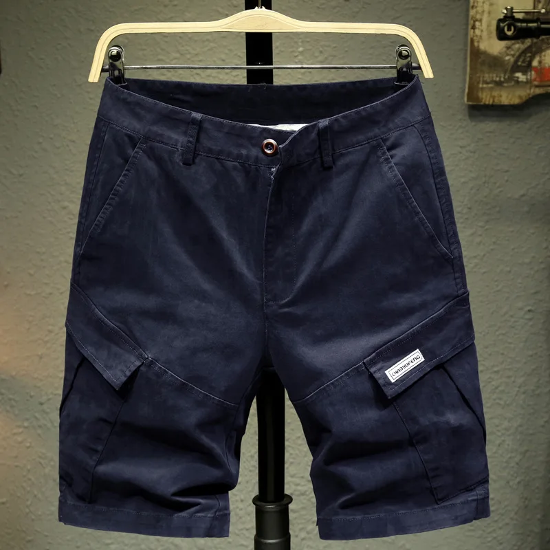 новые хлопковые эластичные рабочие брюки с несколькими карманами для мужчин, свободные прямые брюки, универсальные для молодежи, деловые и повседневные тонкие шорты.