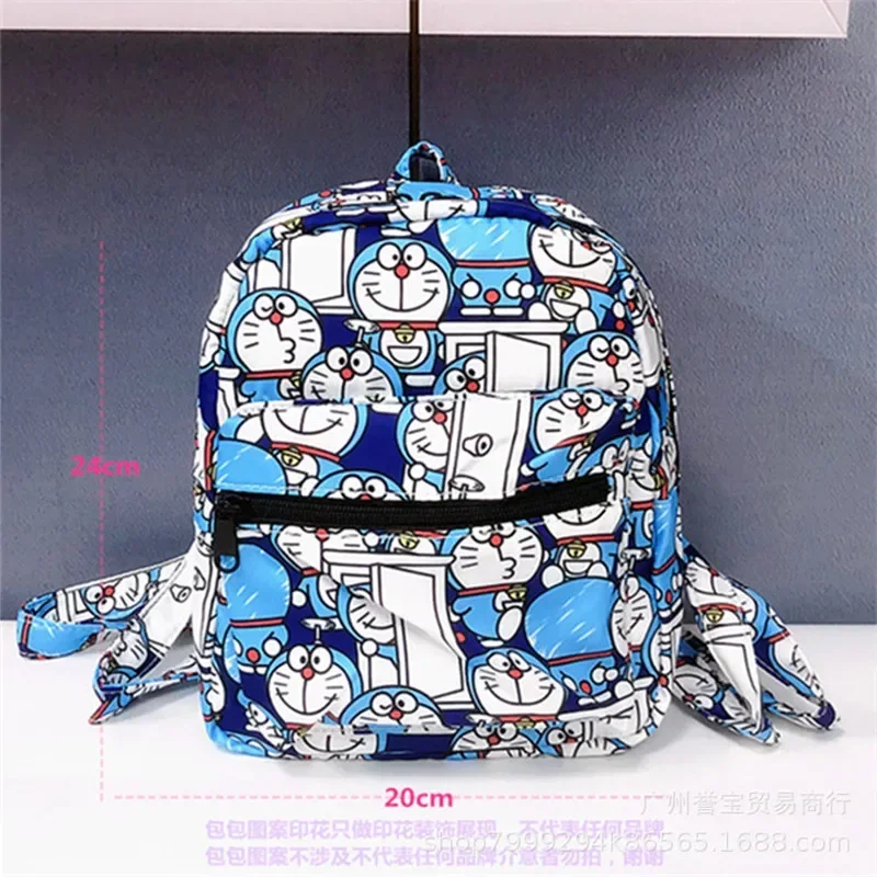 Mochila pequeña de dibujos animados Doraemon para niños, bolsa escolar pequeña impermeable para jardín de infantes, mini mochila Linda para niños y niñas, nueva