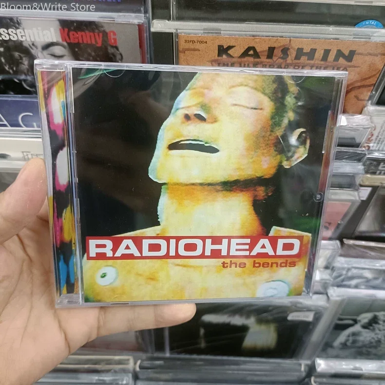 

Ретро-музыка рок-группы Radiohead: музыкальный CD Тома Йорка, альбом The Bends, музыкальная запись, Walkman, саундтреки для вечеринок в машине, коллекционный набор