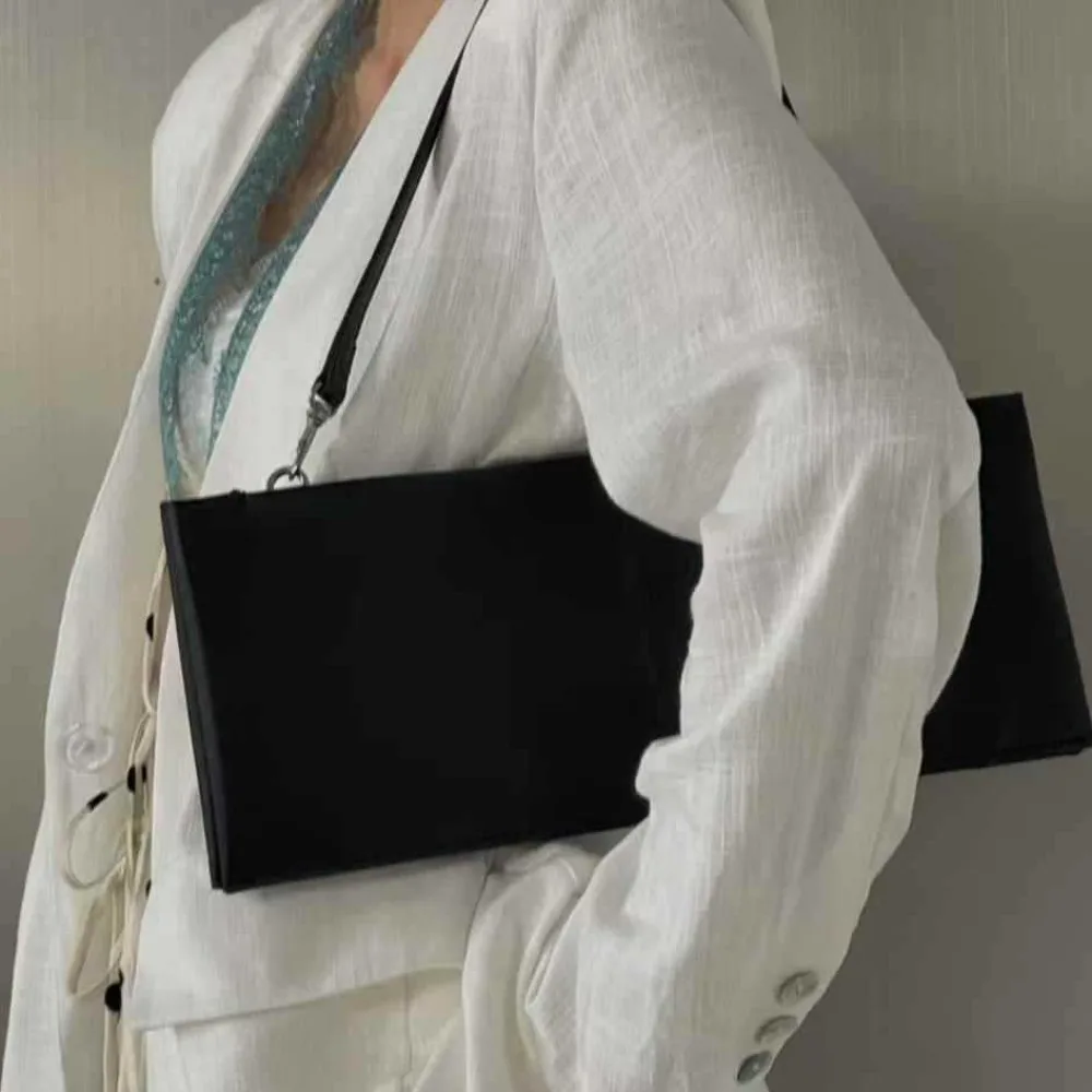 2026 early Spring Premium Bag Women's  New Commuter Armpit Fashionable Simple Niche Design Dinner Shoulderloose Casual