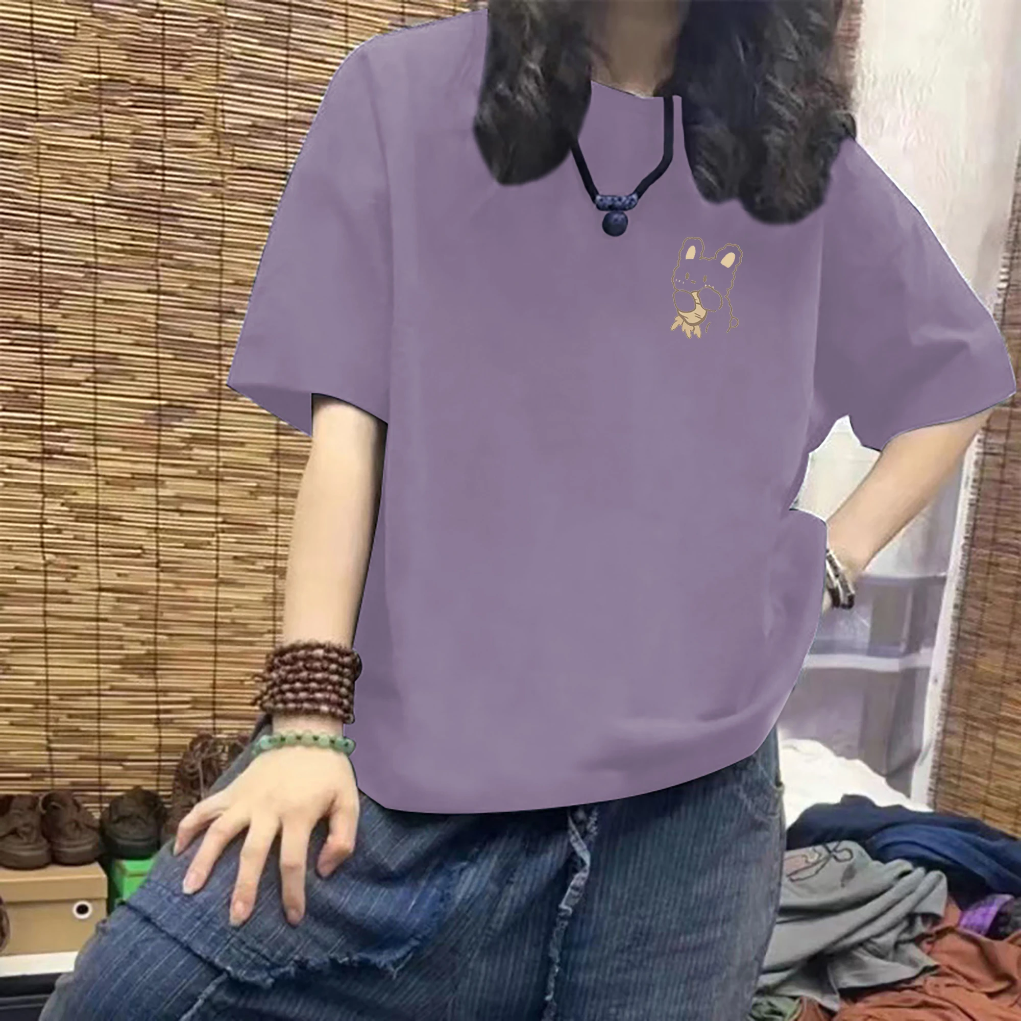Purple [rabbit holding radish on chest]