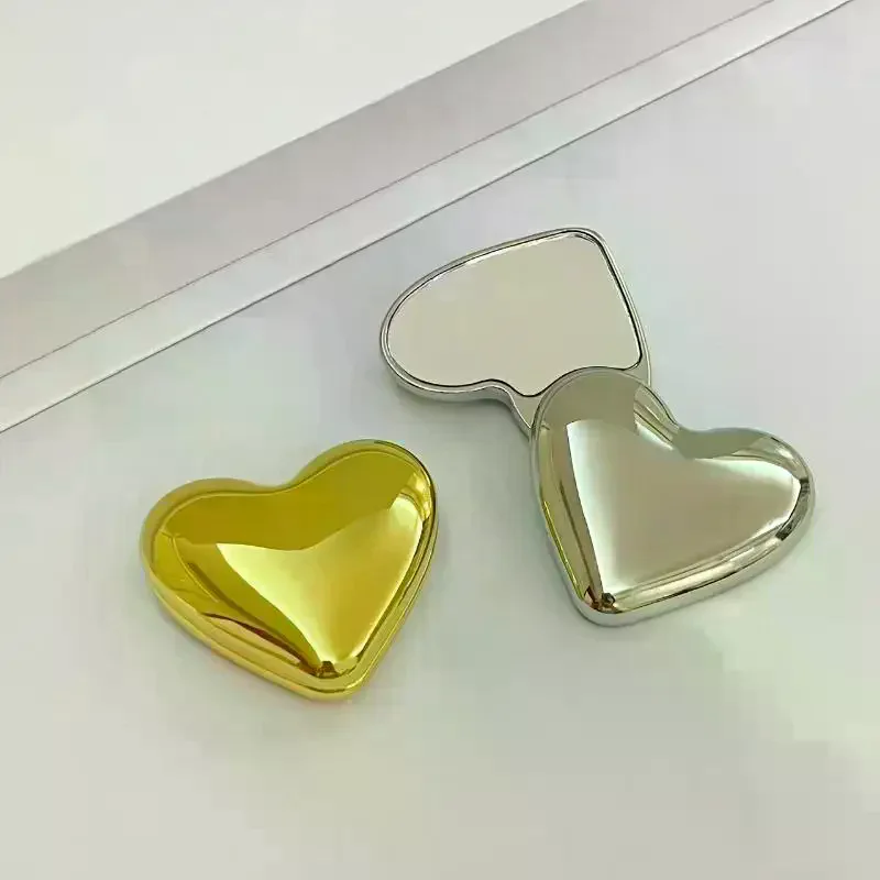 Espejo de maquillaje con forma de corazón de doble cara para niña, espejo pequeño y bonito, espejo giratorio portátil para estudiantes, herramientas cosméticas de belleza de mano
