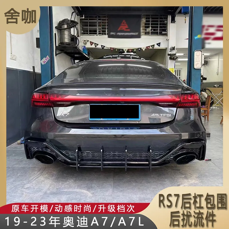 

Suitable for The new Audi A7/A7L has been modified with the CAX version RS7 rear bumper bumper and a bright black blade rear spo