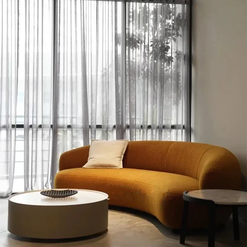 

Nordic designer curved small apartment living room cashew sofa Internet celebrity lamb wool fabric